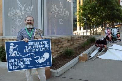 Pastor Clay Hall of Kentucky demonstrates against abortion and in favor of a resolution to abolish abortion.