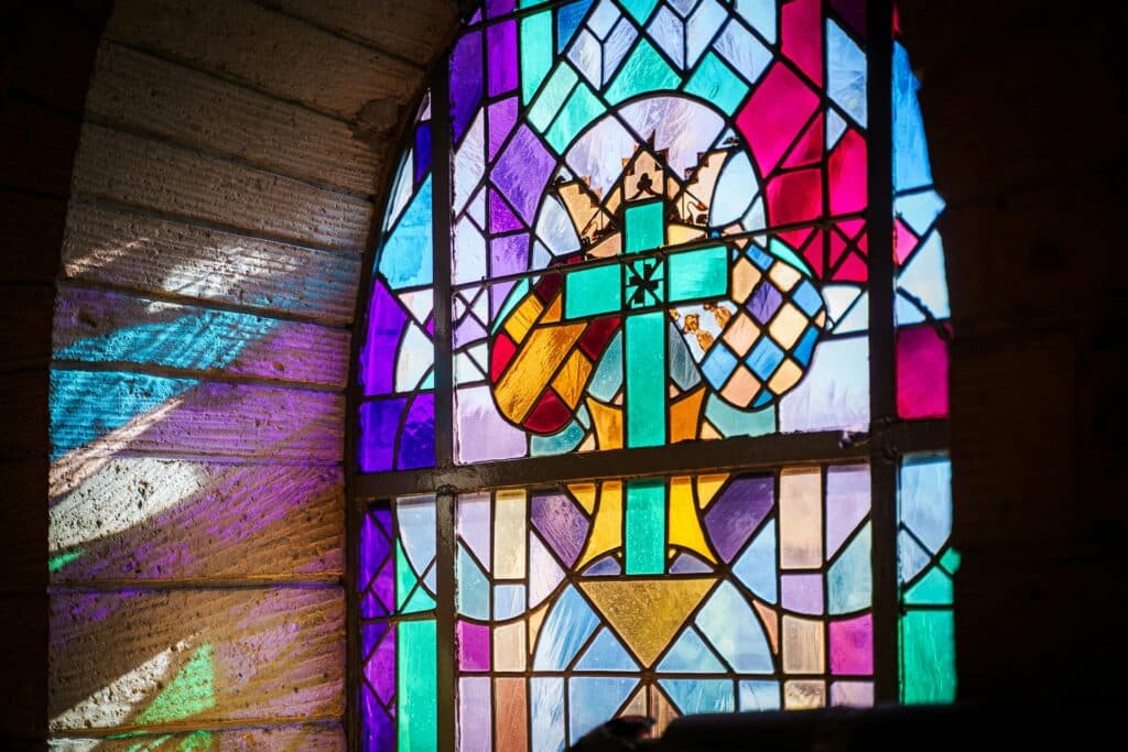 cross stained glass lenten lent light color church traditional catholic anglican